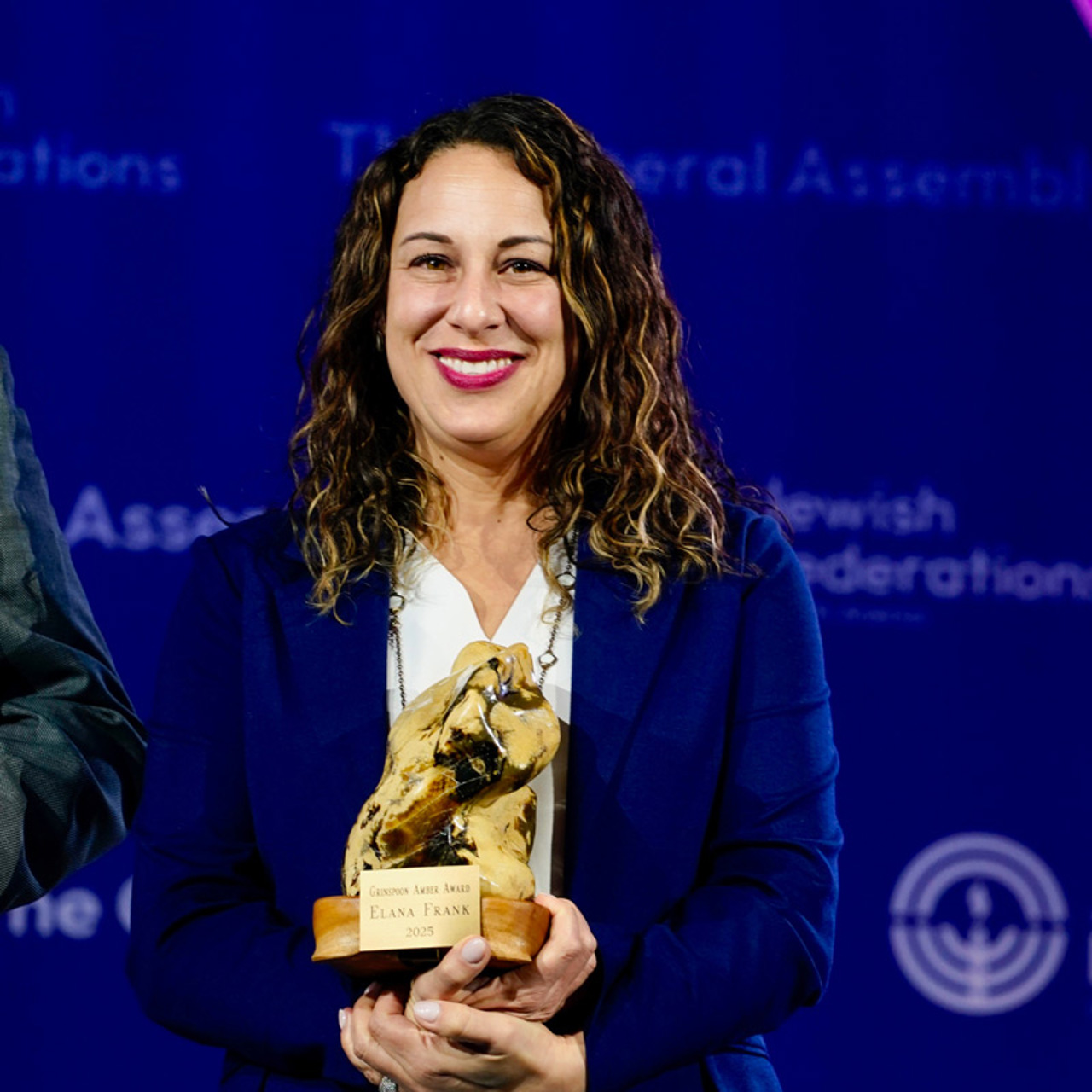 Elana_Frank_Holding_Amber_Award (1).jpg