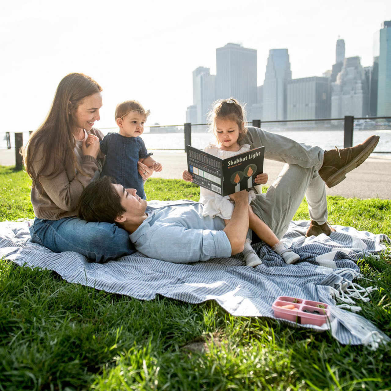 family_in_park_reading.jpg